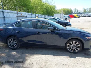 2020 Mazda 3 Select z VIN JM1BPACL2L1165675, wystawiony jako IAAI lot #42232872 z przebiegiem 99 261 mil mil oraz . Historia ofert i sprzedaży dostępna na DreamBid. Obrazek 13.