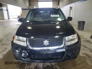 2009 Suzuki Grand Vitara with VIN JS3TE042694100010, listed as a Copart auction lot 56716225 with 148,495 mi miles and Salvage title. Bid and sale history available at DreamBid. Image 5.