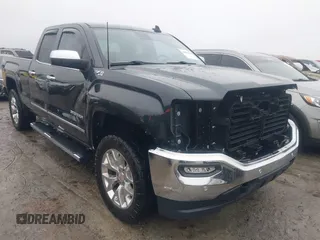 2017 GMC Sierra 1500 SLT z VIN 1GTV2NEC5HZ180843, wystawiony jako IAAI lot #41509410 z przebiegiem 89 943 mil mil oraz . Historia ofert i sprzedaży dostępna na DreamBid. Obrazek 1.