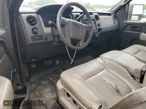 2010 Ford F-150 XL with VIN 1FTMF1CW2AFC54023, listed as a Copart auction lot 57428195 with 183,892 mi miles and Salvage title. Bid and sale history available at DreamBid. Image 8.