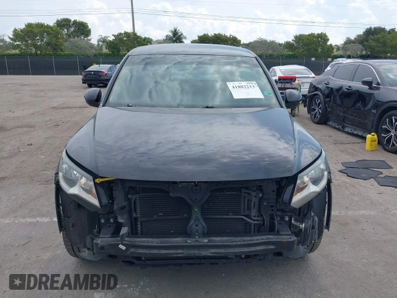2014 Volkswagen Tiguan SE z VIN WVGAV3AXXEW535128, wystawiony jako IAAI lot #41882213 z przebiegiem 103 161 mil mil oraz . Historia ofert i sprzedaży dostępna na DreamBid. Obrazek 12.