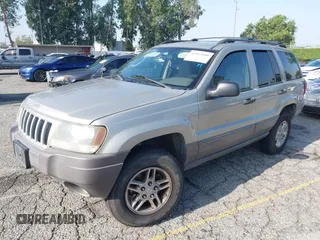 2004 Jeep Grand Cherokee Laredo with VIN 1J4GX48N24C334983, listed as a IAAI auction lot 42522088 with 169,793 mi miles and . Bid and sale history available at DreamBid. Image 2.