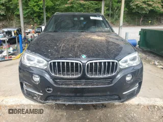 2017 BMW X5 xDrive35i z VIN 5UXKR0C50H0U53714, wystawiony jako Copart lot #57899365 z przebiegiem 124 846 mil mil oraz Szkoda całkowita • Salvage title. Historia ofert i sprzedaży dostępna na DreamBid. Obrazek 5.