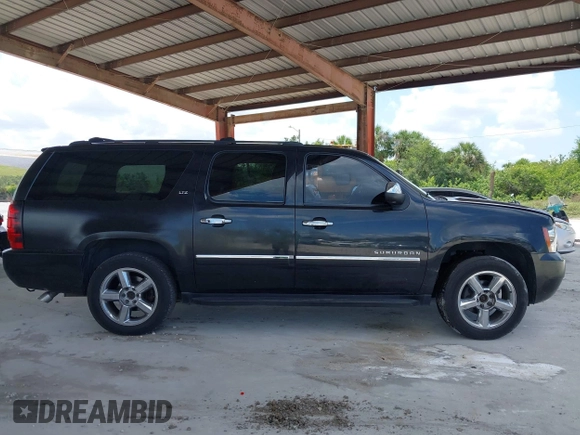 2011 Chevrolet Suburban LTZ with VIN 1GNSKKE3XBR180241, listed as a IAAI auction lot 42365771 with 231,477 mi miles and . Bid and sale history available at DreamBid. Image 13.