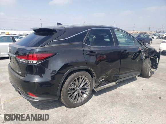 2021 Lexus RX with VIN 2T2YGMDA3MC059852, listed as a Copart auction lot 59737534 with 42,631 mi miles and Salvage Title. Bid and sale history available at carsss.com. Image 3.
