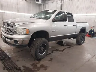 2004 Dodge Ram 2500 SLT with VIN 3D7KU28C84G100913, listed as a IAAI auction lot 41699331 with 372,400 mi miles. Bid and sale history available at carsss.com. Image 2.