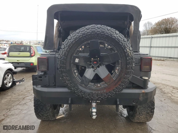 2007 Jeep Wrangler Unlimited X with VIN 1J4GA391X7L171902, listed as a Copart auction lot 82150334 with 167,695 mi miles and Salvage Title. Bid and sale history available at carsss.com. Image 6.