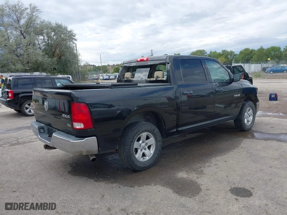 2009 Dodge Ram 1500 SLT with VIN 1D3HV13P69S721371, listed as a IAAI auction lot 40324089 with 215,058 mi miles. Bid and sale history available at carsss.com. Image 4.