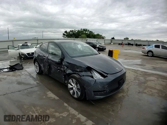2023 Tesla Model Y Long Range with VIN 7SAYGDEE3PA151887, listed as a Copart auction lot 51459495 with 15,562 mi miles and Salvage Title. Bid and sale history available at DreamBid. Image 12.