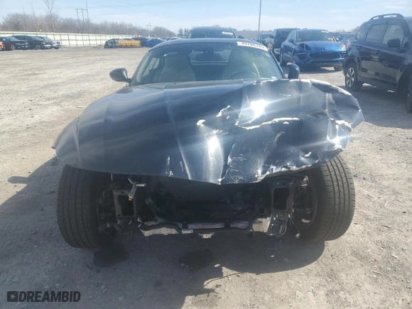 2010 BMW Z4 sDrive30i with VIN WBALM5C57AE162215, listed as a Copart auction lot 49708785 with 0 mi miles and Salvage Title. Bid and sale history available at carsss.com. Image 5.