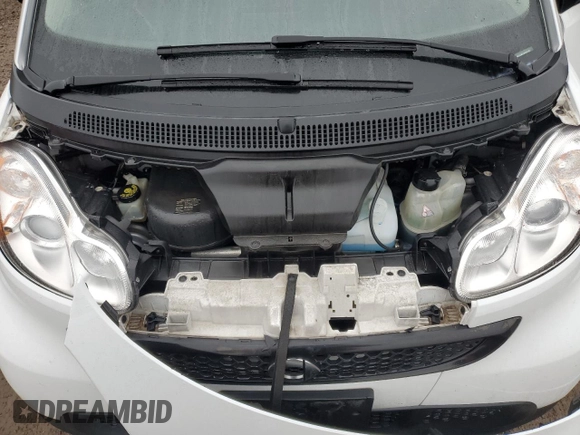 2015 Smart fortwo Passion z VIN WMEEJ3BA3FK791701, wystawiony jako Copart lot #86552704 z przebiegiem 27 313 mil mil oraz Szkoda całkowita • Salvage title. Historia ofert i sprzedaży dostępna na DreamBid. Obrazek 12.