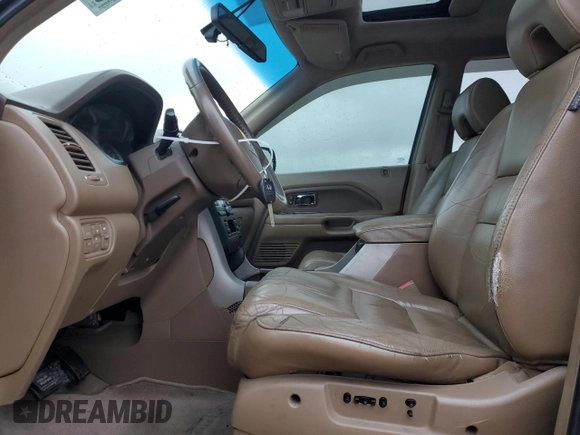 2006 Honda Pilot EX-L with VIN 5FNYF28516B003593, listed as a Copart auction lot 53879665 with 153,264 mi miles and Salvage Title. Bid and sale history available at DreamBid. Image 7.