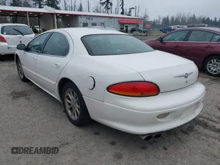 2000 Chrysler LHS with VIN 2C3HC56G4YH382301, listed as a IAAI auction lot 41324699 with 220,076 mi miles and . Bid and sale history available at DreamBid. Image 3.