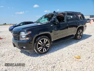 2018 Chevrolet Tahoe LT with VIN 1GNSCBKC5JR190191, listed as a Copart auction lot 59701075 with 104,061 mi miles and Salvage title. Bid and sale history available at DreamBid. Image 1.