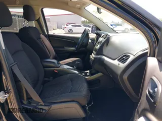 2015 Dodge Journey SXT with VIN 3C4PDCBG0FT595359, listed as a IAAI auction lot 41987773 with 135,528 mi miles. Bid and sale history available at carsss.com. Image 5.
