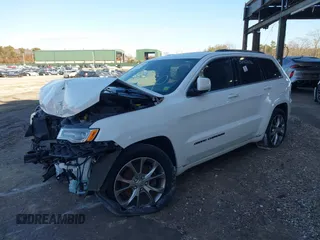 2020 Jeep Grand Cherokee Summit with VIN 1C4RJFJT0LC163752, listed as a IAAI auction lot 38725572 with 49,652 mi miles and . Bid and sale history available at DreamBid. Image 2.