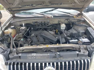 2005 Mercury Mariner Luxury z VIN 4M2CU57135DJ23718, wystawiony jako IAAI lot #42441869 z przebiegiem 179 378 mil mil oraz . Historia ofert i sprzedaży dostępna na DreamBid. Obrazek 10.
