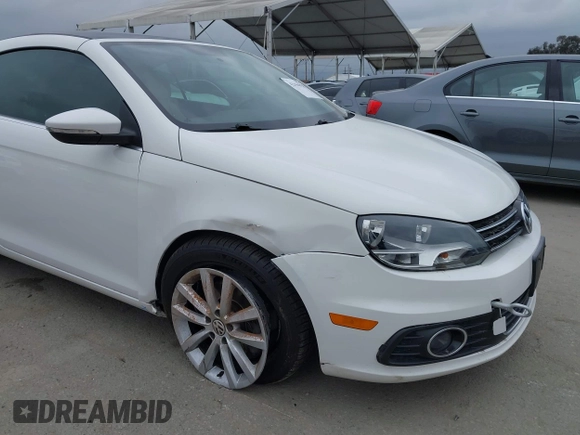 2012 Volkswagen Eos Komfort with VIN WVWBW7AH6CV004193, listed as a IAAI auction lot 42194925 with 71,401 mi miles and . Bid and sale history available at DreamBid. Image 6.