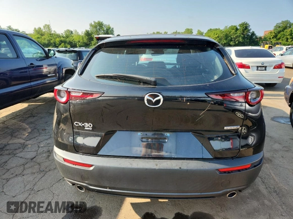 2020 Mazda CX-30 с VIN 3MVDMBBL7LM123139, выставлен на аукционе Copart как лот 64011735 с пробегом 46 830 миль миль и Списание • Salvage title. История ставок и продаж доступна на DreamBid. Изображение 6.