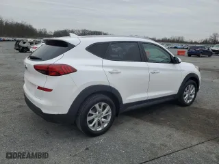 2019 Hyundai Tucson Value with VIN KM8J33A41KU979274, listed as a Copart auction lot 51645475 with 122,666 mi miles and Clean Title. Bid and sale history available at carsss.com. Image 3.