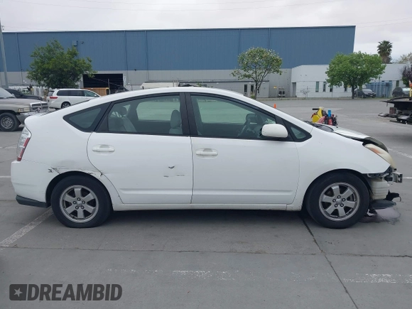2004 Toyota Prius with VIN JTDKB22U640049837, listed as a IAAI auction lot 42033704 with 160,028 mi miles and . Bid and sale history available at DreamBid. Image 14.