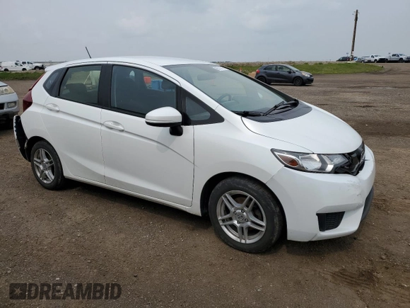 2016 Honda Fit LX with VIN JHMGK5H59GX004764, listed as a Copart auction lot 65131715 with 75,726 mi miles and Salvage title. Bid and sale history available at DreamBid. Image 4.