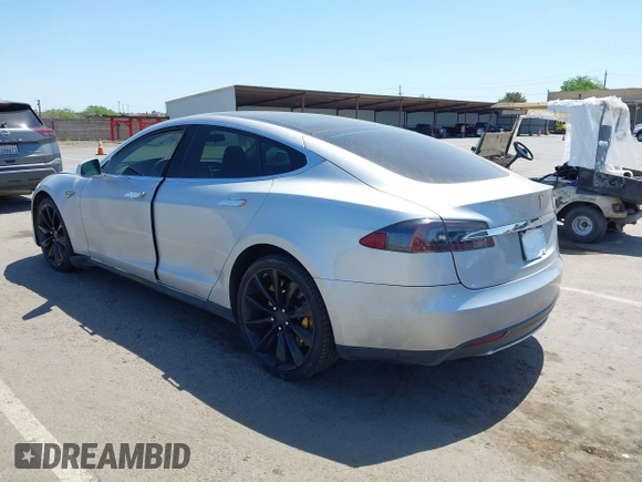 2013 Tesla Model S with VIN 5YJSA1CN5DFP11381, listed as a IAAI auction lot 42087803 with 146,818 mi miles and . Bid and sale history available at DreamBid. Image 3.