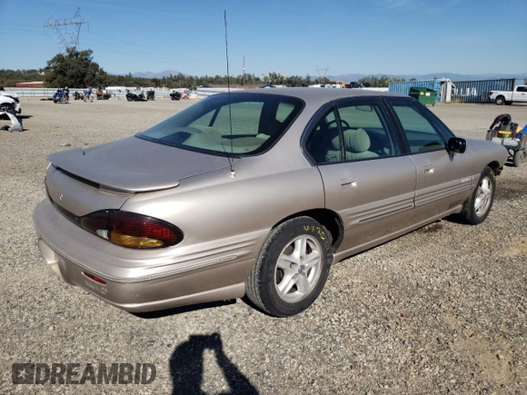 1999 Pontiac Bonneville SE z VIN 1G2HX52K4XH247855, wystawiony jako Copart lot #72559044 z przebiegiem 160 677 mil mil oraz Szkoda całkowita • Salvage title. Historia ofert i sprzedaży dostępna na DreamBid. Obrazek 3.