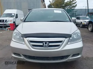 2006 Honda Odyssey EX-L z VIN 5FNRL38766B018014, wystawiony jako IAAI lot #41497144 z przebiegiem 230 225 mil mil oraz . Historia ofert i sprzedaży dostępna na DreamBid. Obrazek 12.