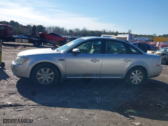 2009 Ford Taurus SE with VIN 1FAHP23WX9G120232, listed as a IAAI auction lot 41449199 with 162694 miles. Bid and sale history available at carsss.com. Image 14.