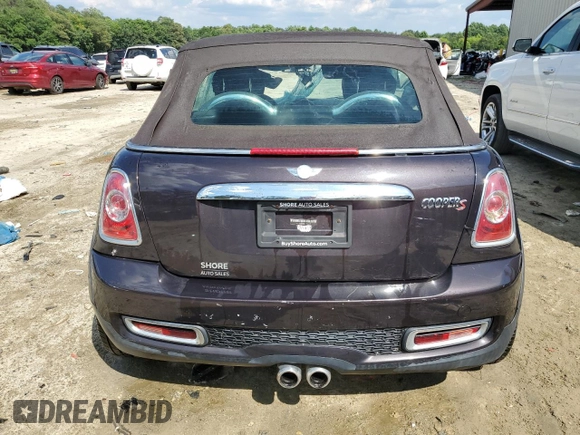 2013 MINI Convertible S with VIN WMWZP3C51DT551311, listed as a Copart auction lot 56083284 with Not provided miles and Salvage title. Bid and sale history available at DreamBid. Image 6.