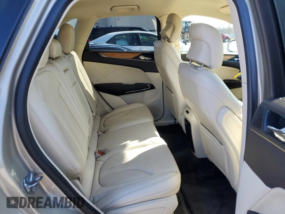 2015 Lincoln MKC with VIN 5LMTJ2AH0FUJ19784, listed as a Copart auction lot 51112455 with 72,123 mi miles and Salvage Title. Bid and sale history available at DreamBid. Image 11.