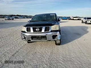 2004 Nissan Titan LE with VIN 1N6AA07A74N516071, listed as a Copart auction lot 87472284 with 140,011 mi miles and Salvage Title. Bid and sale history available at DreamBid. Image 11.
