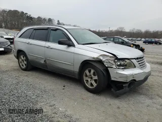 2005 Chrysler Pacifica Touring with VIN 2C4GM68455R360200, listed as a Copart auction lot 87749395 with 253,495 mi miles and Salvage Title. Bid and sale history available at DreamBid. Image 4.