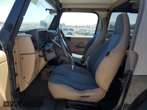 1999 Jeep Wrangler Sahara with VIN 1J4FY49S8XP472733, listed as a Copart auction lot 58174915 with 170,838 mi miles and Salvage title. Bid and sale history available at DreamBid. Image 7.