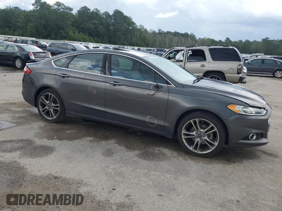 2016 Ford Fusion Titanium with VIN 3FA6P0K90GR180288, listed as a Copart auction lot 60218155 with 140,502 mi miles and Salvage title. Bid and sale history available at DreamBid. Image 4.