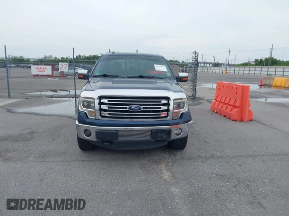 2013 Ford F-150 XL with VIN 1FTFW1ETXDKF51063, listed as a IAAI auction lot 42790441 with 303,665 mi miles and . Bid and sale history available at DreamBid. Image 12.
