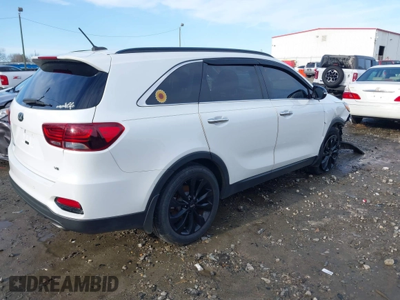 2019 Kia Sorento LX with VIN 5XYPG4A54KG599963, listed as a IAAI auction lot 41558055 with 119,238 mi miles and . Bid and sale history available at DreamBid. Image 4.
