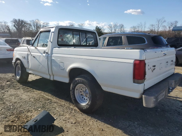 1987 Ford F-150 with VIN 1FTCF15Y7HNA56371, listed as a Copart auction lot 85441274 with 76,200 mi miles and Salvage Title. Bid and sale history available at carsss.com. Image 2.