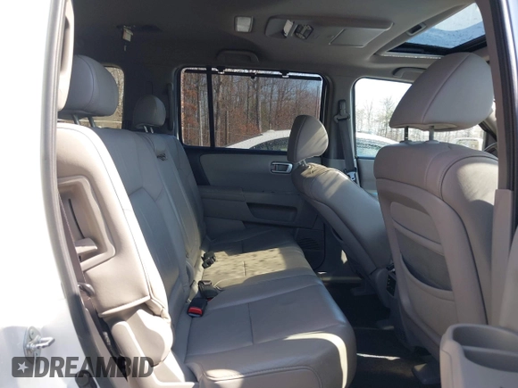 2011 Honda Pilot Touring with VIN 5FNYF4H96BB014095, listed as a IAAI auction lot 41794052 with 202,440 mi miles and . Bid and sale history available at DreamBid. Image 8.