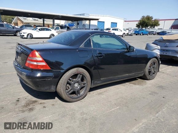 2001 Mercedes-Benz SLK-Class with VIN WDBKK65F71F175734, listed as a Copart auction lot 61874984 with 185,408 mi miles and Salvage Title. Bid and sale history available at carsss.com. Image 3.