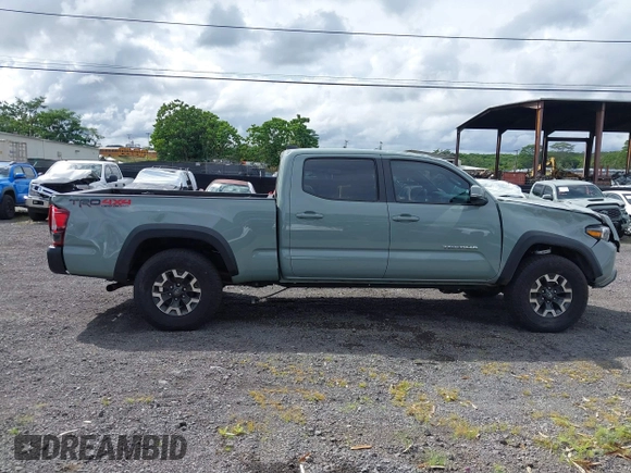 2023 Toyota Tacoma SR5 z VIN 3TYDZ5BNXPT024914, wystawiony jako IAAI lot #41302756 z przebiegiem 20 307 mil mil oraz . Historia ofert i sprzedaży dostępna na DreamBid. Obrazek 14.