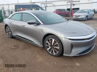 2023 Lucid Air Touring with VIN 50EA1TEAXPA004884, listed as a IAAI auction lot 41465547 with 18,051 mi miles. Bid and sale history available at carsss.com. Image 1.