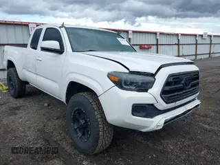 2016 Toyota Tacoma SR with VIN 5TFSX5EN2GX045433, listed as a IAAI auction lot 41939147 with 122,702 mi miles and . Bid and sale history available at DreamBid. Image 1.