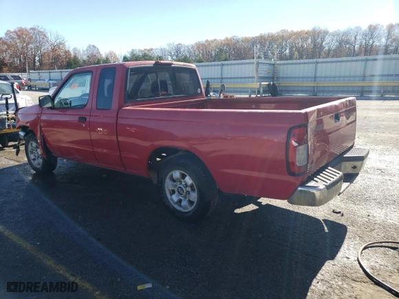 2000 Nissan Frontier 2WD XE with VIN 1N6DD26S2YC407142, listed as a Copart auction lot 79825074 with 216,842 mi miles and Salvage Title. Bid and sale history available at carsss.com. Image 2.