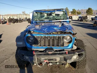 2024 Jeep Wrangler Rubicon z VIN 1C4PJXCG1RW298288, wystawiony jako Copart lot #81371914 z przebiegiem 4 445 mil mil oraz Szkoda całkowita • Salvage title. Historia ofert i sprzedaży dostępna na DreamBid. Obrazek 5.