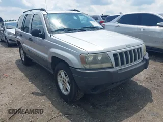 2004 Jeep Grand Cherokee Laredo z VIN 1J4GX48N04C435603, wystawiony jako IAAI lot #42274197 z przebiegiem 256 163 mil mil oraz . Historia ofert i sprzedaży dostępna na DreamBid. Obrazek 1.