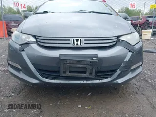 2010 Honda Insight LX with VIN JHMZE2H55AS041684, listed as a IAAI auction lot 42222564 with 296,830 mi miles and . Bid and sale history available at DreamBid. Image 6.