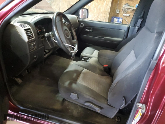 2009 GMC Canyon Work Truck with VIN 1GTCS149098128985, listed as a Copart auction lot 60897045 with 123,843 mi miles and Salvage title. Bid and sale history available at DreamBid. Image 7.