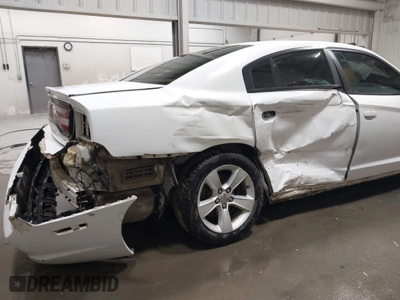 2013 Dodge Charger SE with VIN 2C3CDXBG0DH537056, listed as a IAAI auction lot 42047266 with 132,412 mi miles and . Bid and sale history available at DreamBid. Image 6.